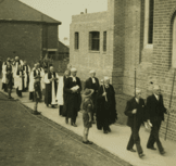 Procession arriving at the new church 1937